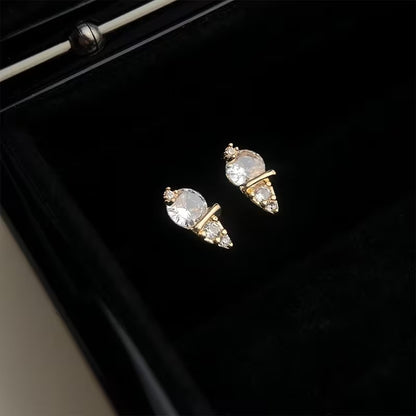 Mini Gold Ice Cream CZ Earrings on a black background