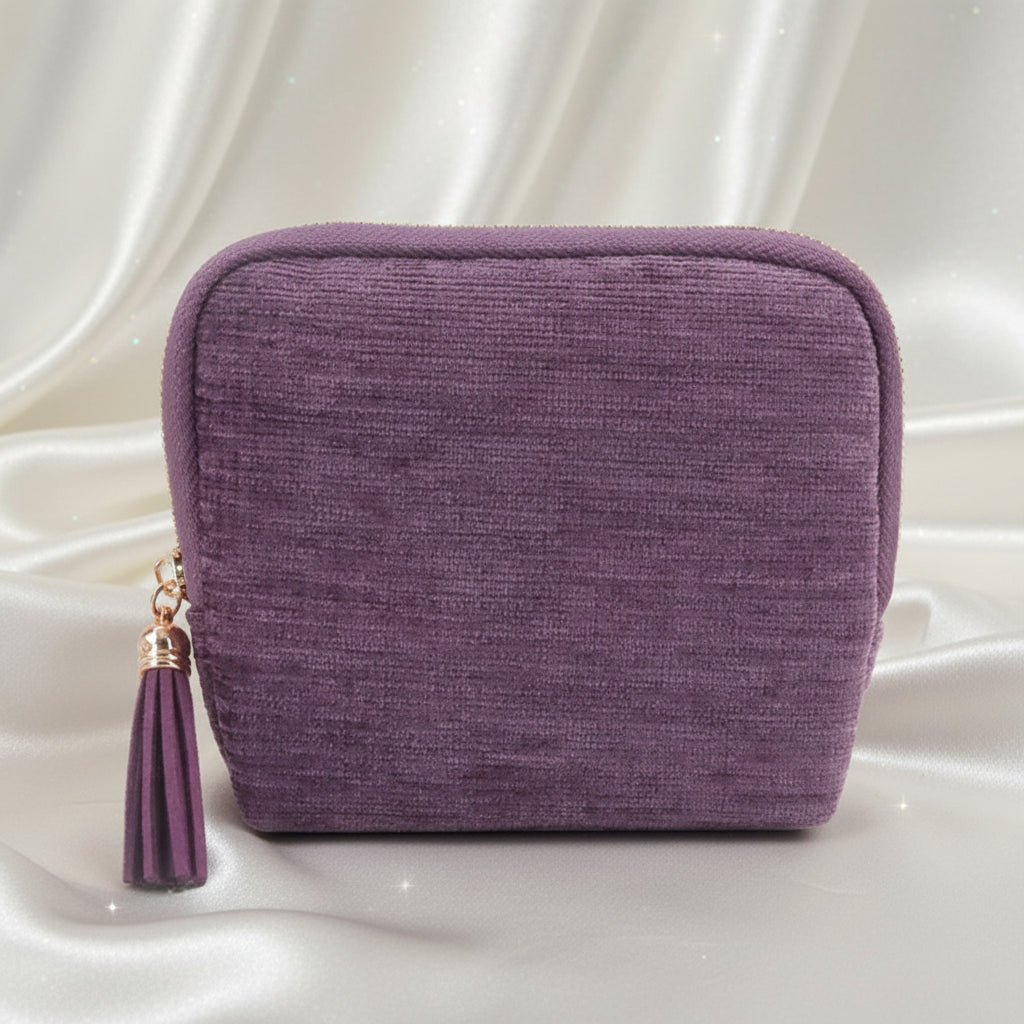 Purple Starcella Jewelry Organizer Travel Case with a tassel on a white background