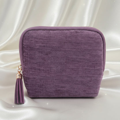 Purple Starcella Jewelry Organizer Travel Case with a tassel on a white background
