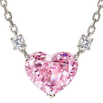 Pink Zirconia Heart Necklace with silver chain on a white background