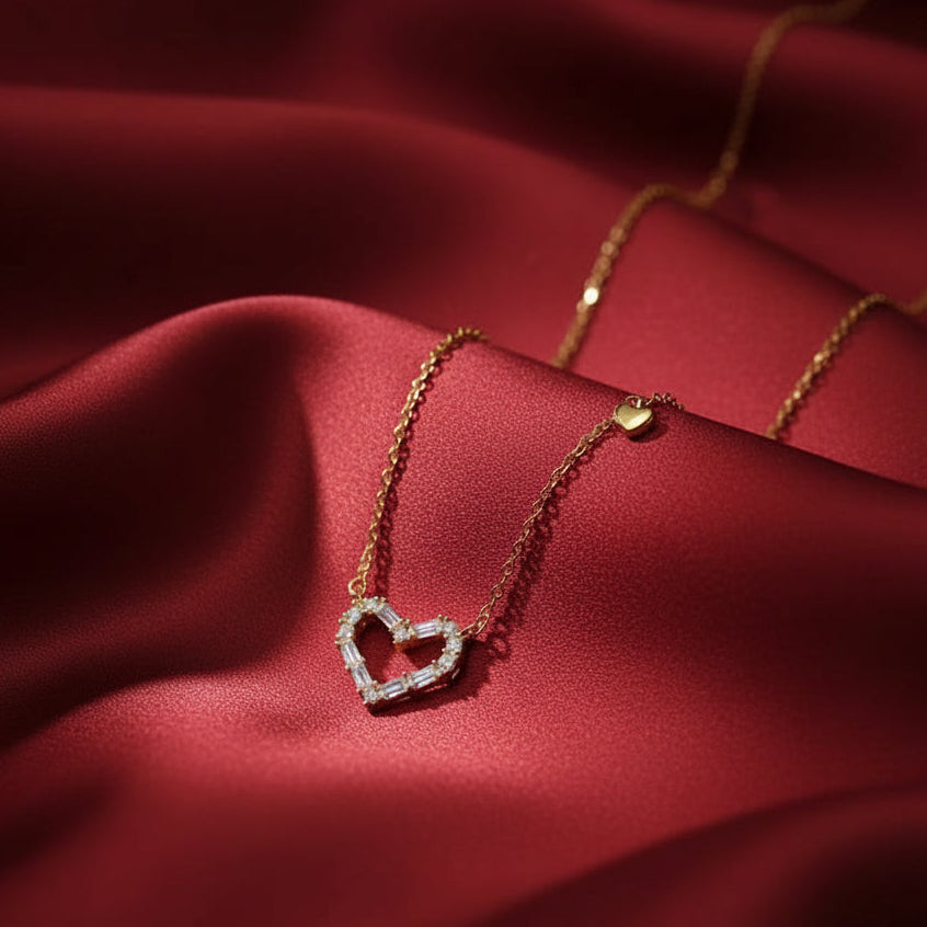 Zircon Double Heart Necklace with a heart-shaped pendant on red fabric
