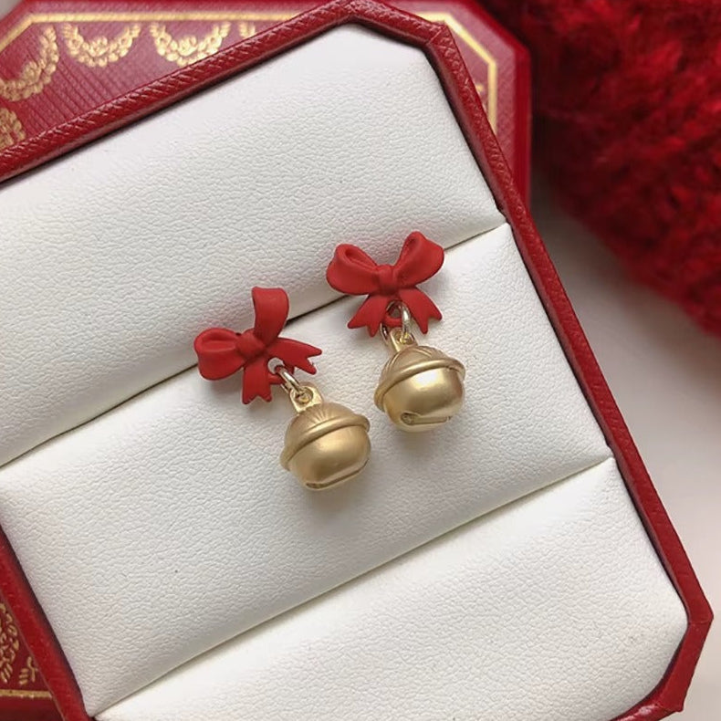 Jingle Bell Bow Earrings in a decorative box