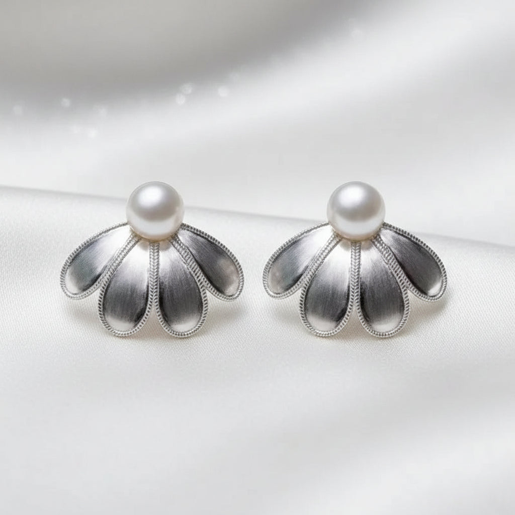Sculpted Petal Pearl Earrings with pearl centers on a white background