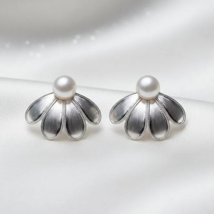 Sculpted Petal Pearl Earrings with pearl centers on a white background