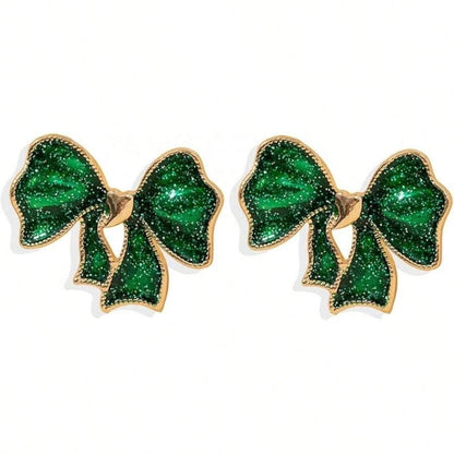 Emerald Glitter Bow Earrings on a white background