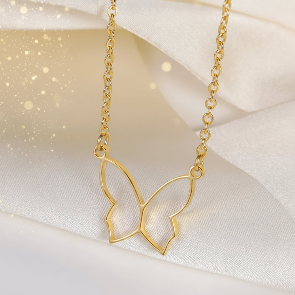 Butterfly Gold Necklace on a soft white background
