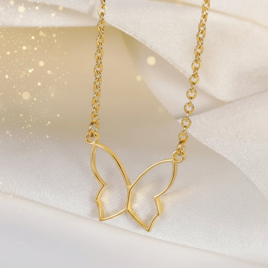 Butterfly Gold Necklace on a soft white background